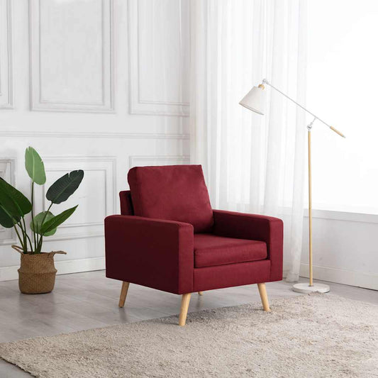 Armchair in wine red fabric