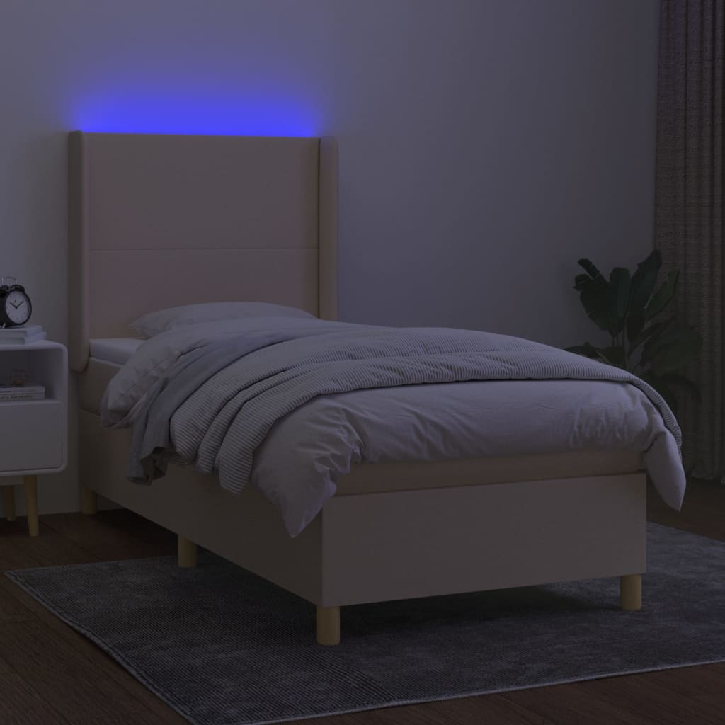 Letto a Molle con Materasso e LED Crema 90x190 cm in Tessuto