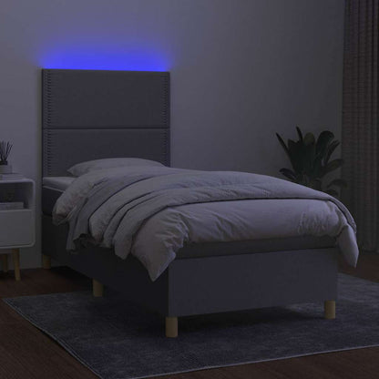 Letto a Molle Materasso e LED Grigio Chiaro 90x190 cm Tessuto